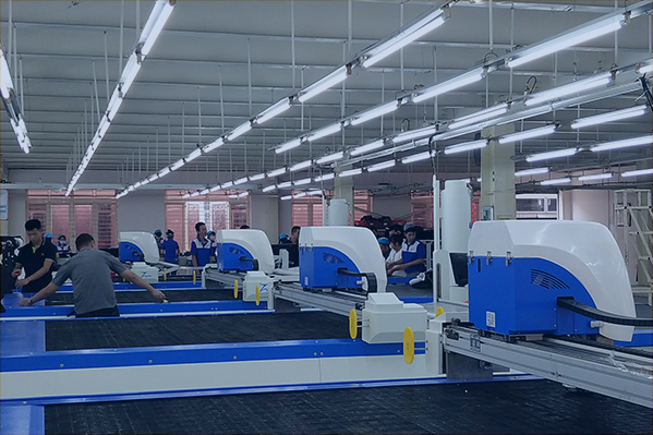 Fabric cutting machine automated